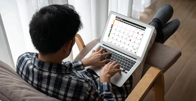 Person working on digital Instagram content calendar